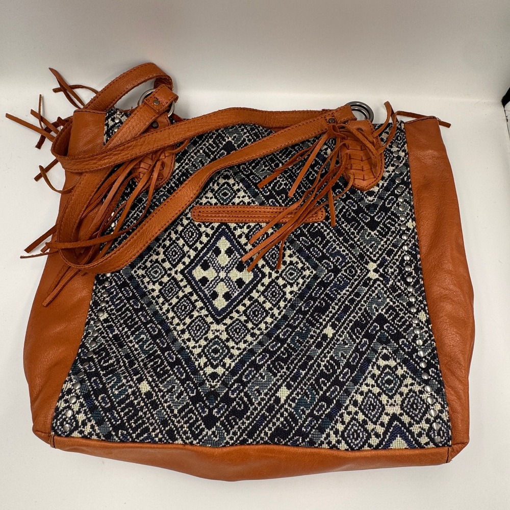 The Sak Leather Textile Boho Fringe Studded Tapestry Tote Bag Cognac Navy Multi